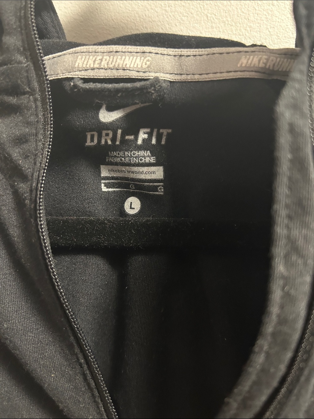 Nike Black Dri-FIT Women’s 3/4 Sleeve Performance Jacket with zippered pocket